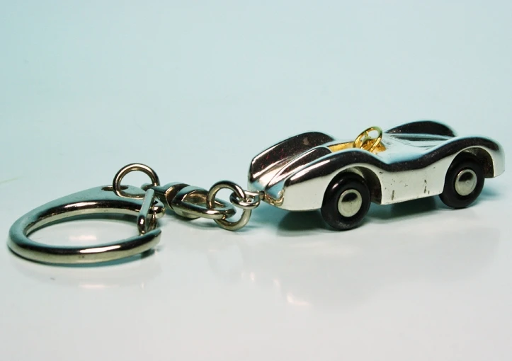 Schuco Piccolo Mercedes Benz W196 Stromlinie Rennwagen Schlüsselanhänger 2 Schuco Piccolo Mercedes Benz W196 Stromlinie Rennwagen Schlüsselanhänger – Bild 2