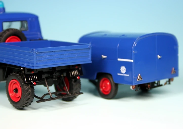 Schuco Mercedes Benz Unimog U 411 Pritsche Mit TSA 8 Anhänger "THW" 4 Schuco Mercedes Benz Unimog U 411 Pritsche Mit TSA 8 Anhänger "THW" – Bild 4