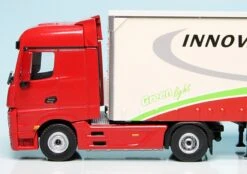 Schuco Mercedes Benz Actros (2011) Gardinenplanen-Sattelzug "Fliegl MegaRunner" -Schuco 452206000 Schuco Mercedes Benz Actros 2011 Gardinenplanen Sattelzug Fliegl MegaRunner z4