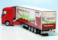 Schuco Mercedes Benz Actros (2011) Gardinenplanen-Sattelzug "Fliegl MegaRunner" -Schuco 452206000 Schuco Mercedes Benz Actros 2011 Gardinenplanen Sattelzug Fliegl MegaRunner z6