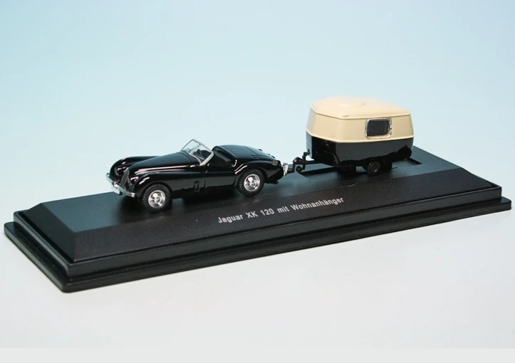 Schuco Jaguar XK 120 Roadster Mit Hymer Eriba Puck Wohnwagen 1 Schuco Jaguar XK 120 Roadster Mit Hymer Eriba Puck Wohnwagen