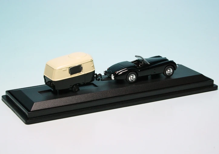 Schuco Jaguar XK 120 Roadster Mit Hymer Eriba Puck Wohnwagen 2 Schuco Jaguar XK 120 Roadster Mit Hymer Eriba Puck Wohnwagen – Bild 2